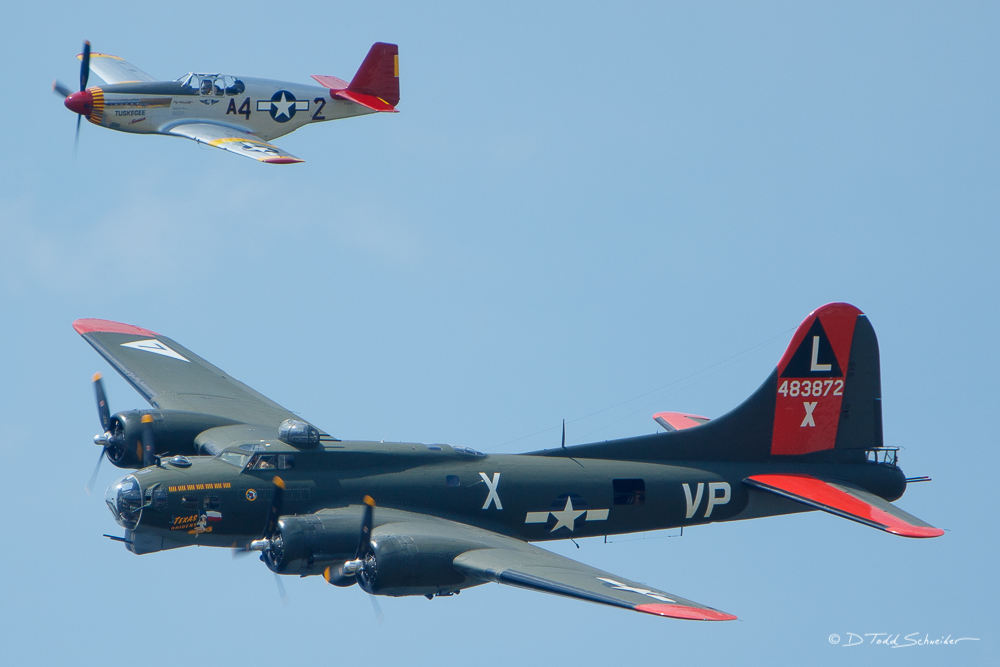A Heritage Flight of a P-51C Mustang, named the Tuskegee Airmen, and the Commemorative Air Force B-17 Texas Raiders Flying Fortress...